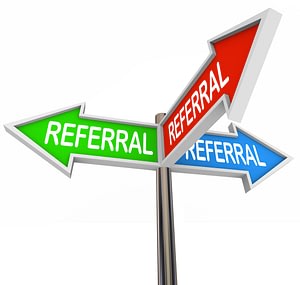 Referral word on three arrow signs pointing to new business, customers, clients, prospects, traffic, patients or visitors in your audience or marketing base